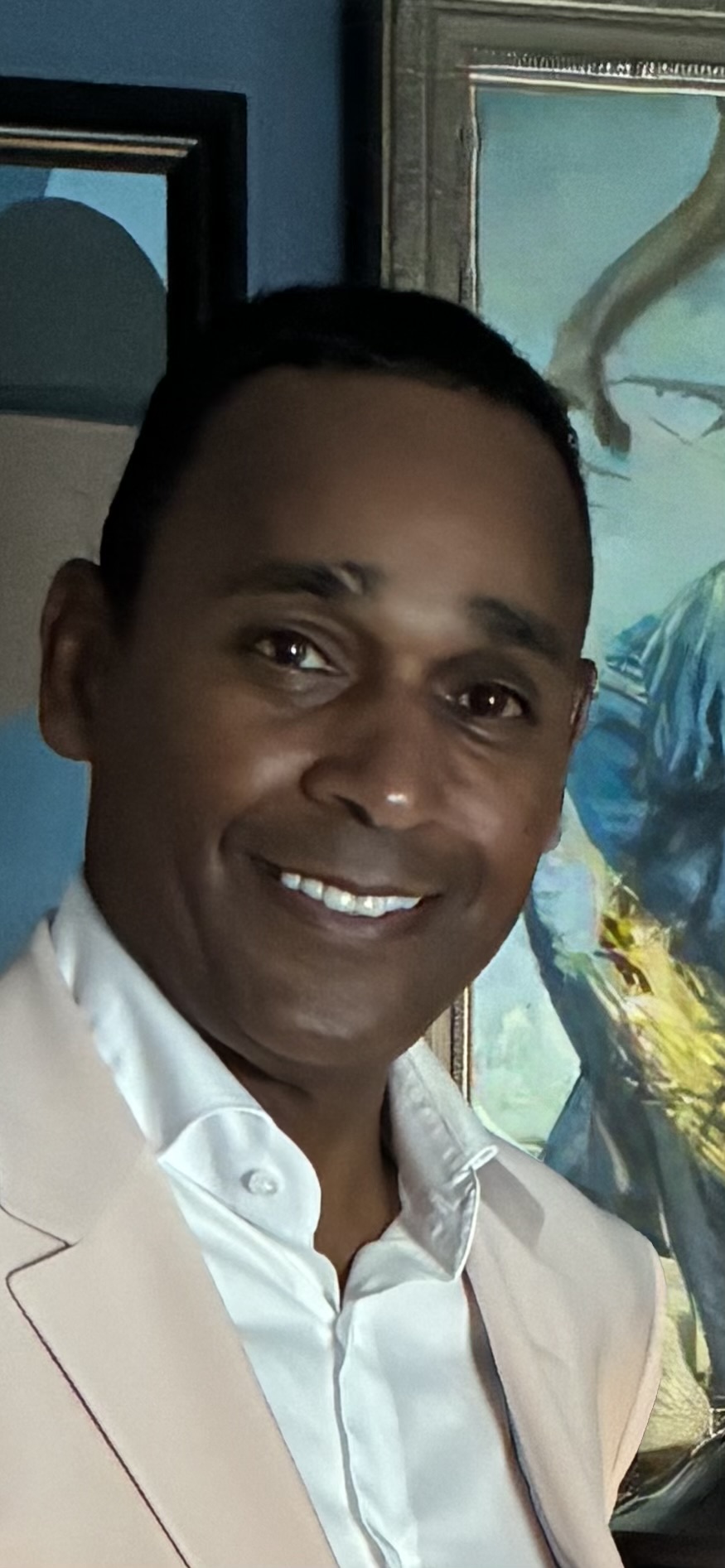Contemporary portrait of Dwayne Ballen in a light jacket and open-collar white shirt