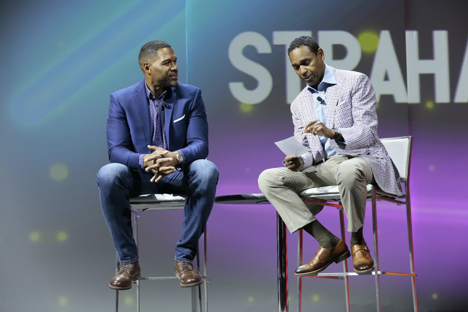 Dwayne Ballen in an on-stage one-on-one conversation with Michael Strahan before a live audience
